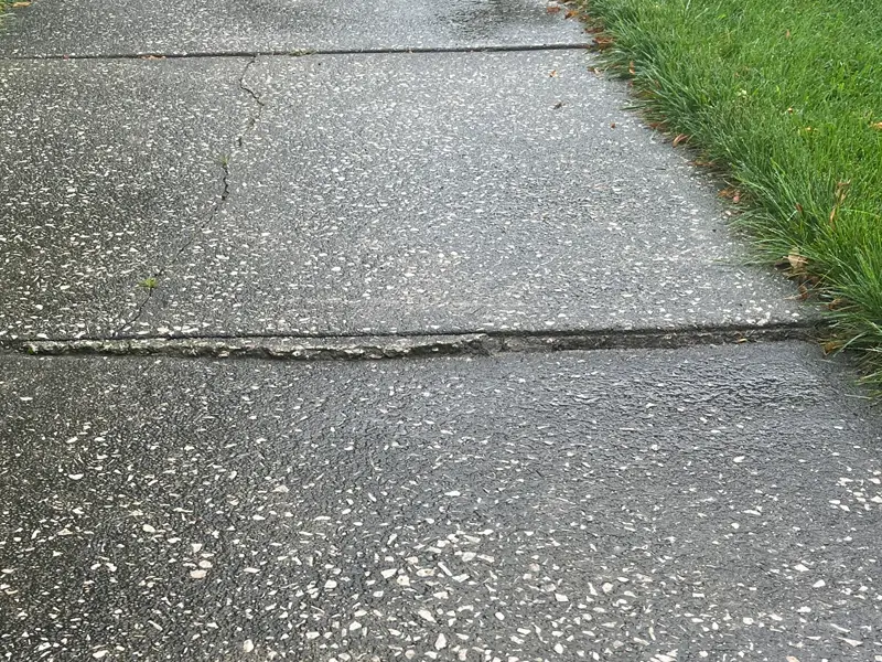 Uneven Sidewalk in Denton, TX Uneven Sidewalk in Denton, TX